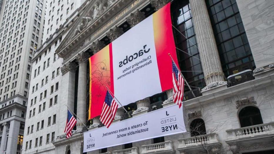 Jacobs banner handing on the front of the New York Stock Exchange